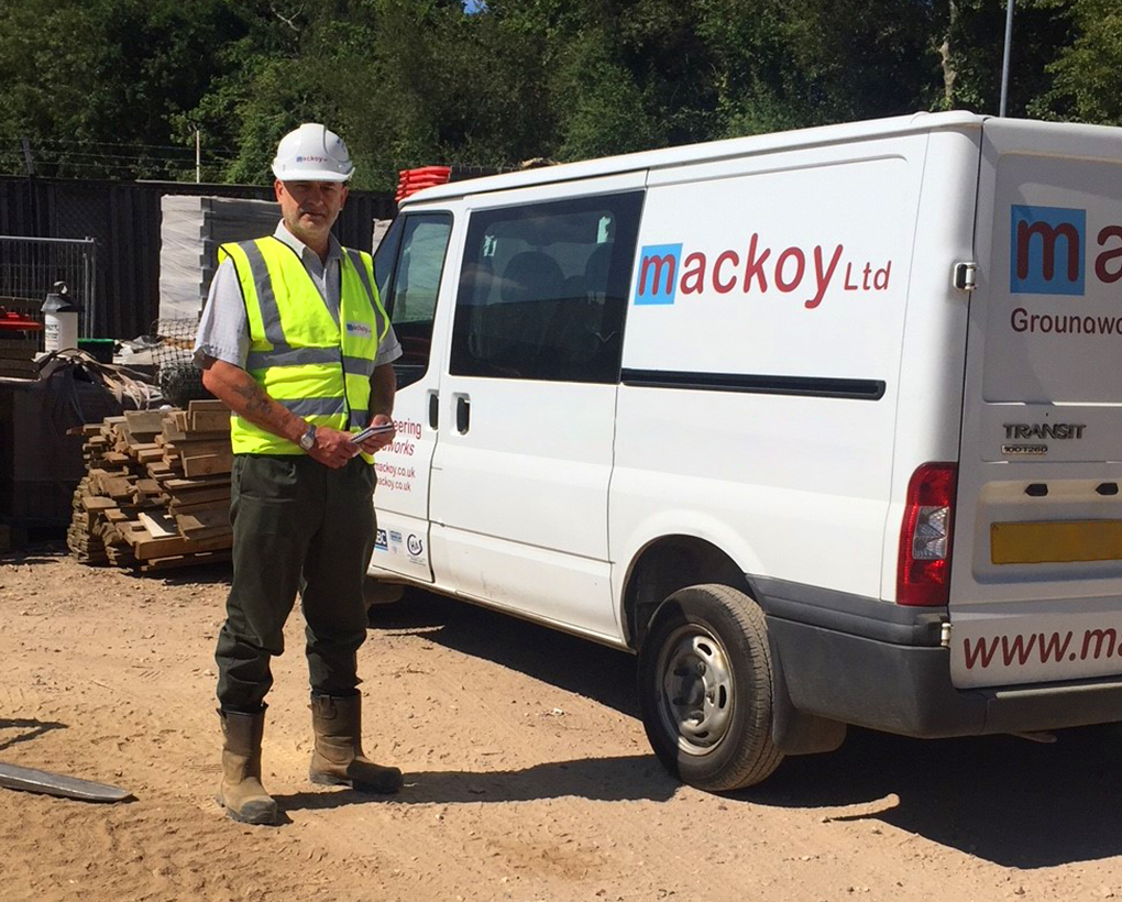 Mackoy Groundworks SHEQ Manager David Bacon next to a Mackoy Van