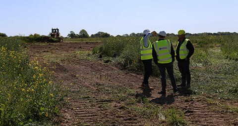 Corporate Social Responsibilty taken seriously by Mackoy Groundworks Operatives deep in discussion