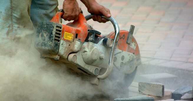 Mackoy Groundworks Health and Safety Protecting from Silica Dust Emerging when Cutting Slabs