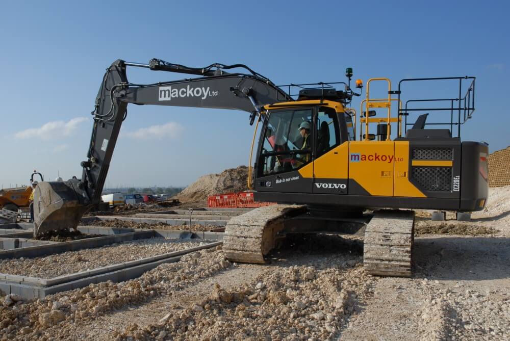 Mackoy Volvo Excavtaor Performing Earthworks around Foundations