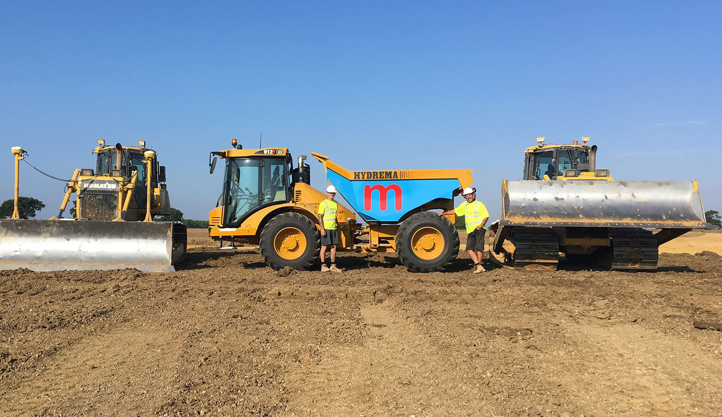 Mackoy Groundworks Operatives on Site with Hydrema Dumper and Bulldozers