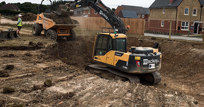 Mackoy Quality Photo August Winner Earthworks Excavator Loading Soil onto Dumper