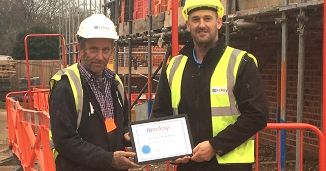 Mackoys Site of the Month Winner receiving his Award on Site