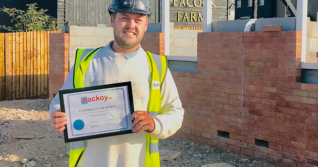 Mackoys Site Manager of the Month being awarded on Groundworks Site