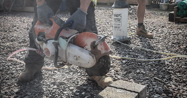 Health and Safety at Mackoy Ltd Groundworks Operatives wearing steel-capped boots