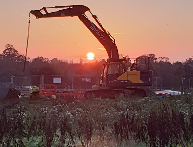 Mackoy Groundworks Photo Competition Winner for October Volvo Excavator and sunset