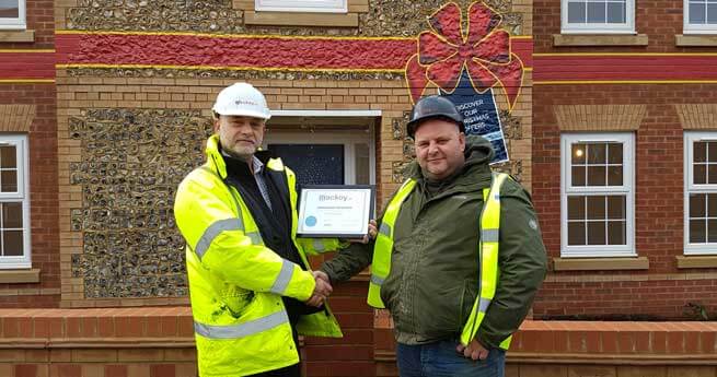 Foreman of the month November receiving his award from SHEQ manager